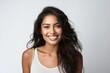 © AJay - Portrait of a smiling young woman of Indian ethnicity having long flowing hair