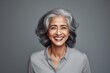 Portrait of a smiling mature woman of Asian ethnicity 