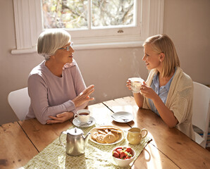 Poster - Talking, grandmother and woman with tea in home for brunch, bonding or visit in retirement. Senior, grandma and girl on coffee break with food, conversation and relax on holiday or vacation morning