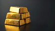 Stacks of pure gold bullion bar on dark background.