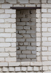 Sticker - A window blocked with bricks in an old house