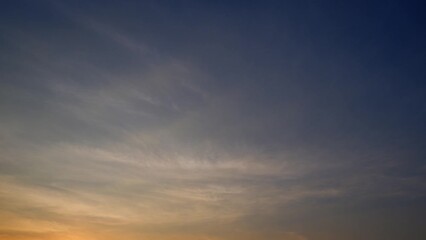 Wall Mural - 4K : Sunset sky time lapse : Timelapse video captures a sunset sky adorned with billowing clouds. Shades of pink, orange, and gold create a spectacle, painting the horizon.

