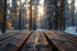 Extravagant winter forest scenery in Finland featuring a rustic dark brown wooden table with a blurred background