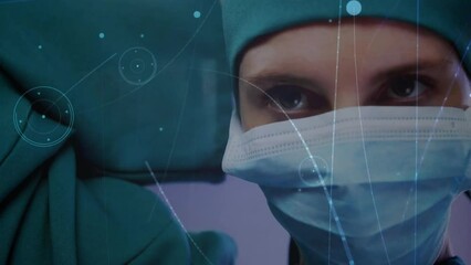 Wall Mural - Animation of network of connections with shapes over caucasian female surgeon during surgery