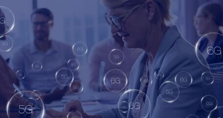 Poster - Animation of 6g texts over caucasian businesswoman using tablet