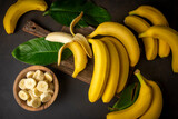 Fototapeta Koty - Bunch of Raw Organic Bananas Ready to Eat