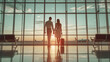 © BONI - Pareja de hombre y mujer de pie agarrados de la mano mirando por un ventanal del aeropuerto al amanecer. Pareja viajando en el aeropuerto.