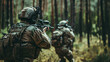 © Evgeniia - Elite military special forces navigate stealthily through the forest, their trained eyes scanning for threats amidst the dense foliage.