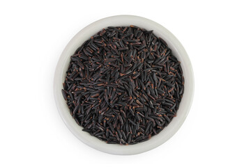 Poster - Black rice in a ceramic bowl isolated on white background. Top view. Flat lay