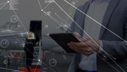 Poster - Animation of network of connections over caucasian businessman using tablet by plane