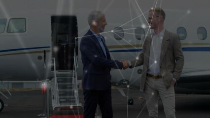 Wall Mural - Animation of network of connections over diverse businessmen by airplane