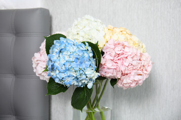 Canvas Print - Beautiful hydrangea flowers in vase indoors, closeup