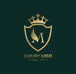 Luxury Crown M logo. Letter M wings logo.