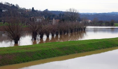 river overflowed due to the incessant rain and the countryside