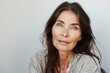 © Artem - Beautiful gorgeous 50s mid aged mature woman looking at camera isolated on white. Mature old lady close up portrait. Healthy face skin care beauty, middle age skincare cosmetics, cosmetology concept