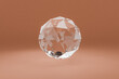 glass sphere floating in the air over infinite single colored background, cosmetic product presentation,  3D Illustration