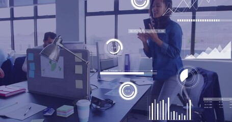 Wall Mural - Animation of financial data processing over biracial businesswoman using smartphone in office