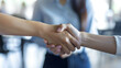 © esp2k - Professional Handshake in Bright Office Setting