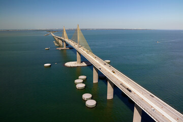 Wall Mural - Sunshine Skyway Bridge over Tampa Bay in Florida with moving traffic. Concept of transportation infrastructure