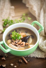 Wall Mural - mushroom hot soup with beans in a bowl