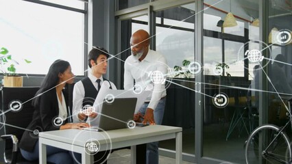 Canvas Print - Animation of network of connections with icons over diverse business people in office