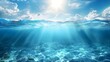 © Ziyan Yang - Tranquil sea water surface on a sunny day, Underwater sea in sunlight, tropical blue ocean underwater background