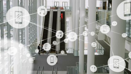 Wall Mural - Animation of network of connections with icons over business people on escalator