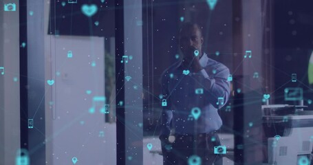 Poster - Animation of network of connections with icons over african american businessman thinking in office