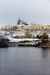 Snowy Prague City with gothic Castle  in the sunny Day, Czech Republic