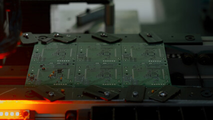 Poster - Coating machine for printed circuit board at work. Creative. Close up of automated robotic mechanism making circuit board.