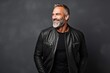 © Inigo - Portrait of a handsome mature man in a leather jacket. Men's beauty, fashion.
