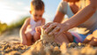 Children's hands building a Sand Castle. Family travel, Sensory play with sand concept