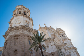 Sticker - Detail with bell towers and central facade of Cathedral of La Santa Cruz of Cádiz in backlit, SPAIN