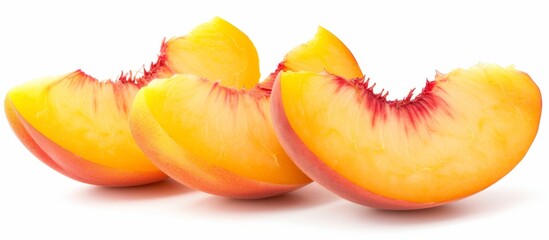 Wall Mural - Fresh ripe peaches cut in half on a wooden surface