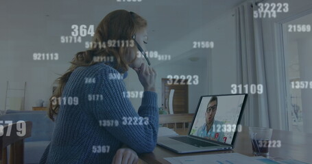 Canvas Print - Image of numbers changing over woman using laptop on image call