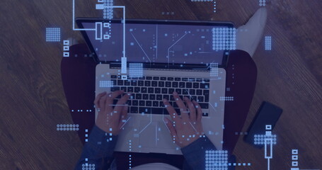 Poster - Image of circuit board with data processing over caucasian man using laptop