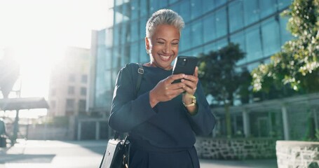 Poster - Senior woman, walking and happy with texting on smartphone in outdoor with laugh, smile and conversation. Lens flare, corporate and female person on break with funny chat in street, city and business