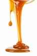 Viscous amber caramel sauce pouring and forming a droplet against a white background, ideal for food and culinary concepts with ample copy space