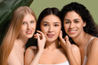© Pixel-Shot - Beautiful young women on green background, closeup