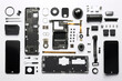 © Degimages - A smartphone disassembled into parts and the parts arranged on a white background.
