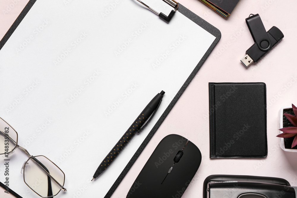 Flash drive, pen, clipboard and computer mouse on white background