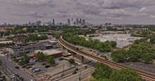 Atlanta Georgia Aerial V932 Flyover West End And Adair Park Towards Castleberry Hill Capturing Train In Motion, Highway Traffic And South And Downtown Cityscape - Shot With Mavic 3 Pro Cine - May 2023