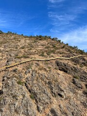 Wall Mural - wooden promenade in mountains, hiking trail, trekking, hills, no people