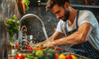 Photo handsome man washing vegetables in the kitchen