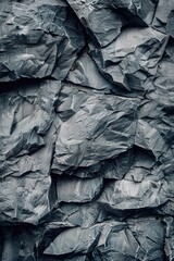 Poster - Black and white photo of a textured rock wall. Suitable for architectural or design projects