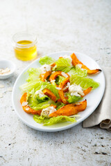 Wall Mural - Healthy salad with roasted pumpkin and almond