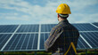 © Alex - Engineer in front of solar panels.