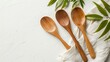 Handcrafted bamboo spoon set on a plain white background, blending natural beauty with functional design.