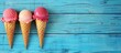 Three tasty sweet ice cream cones over wooden blue background. Generated AI image