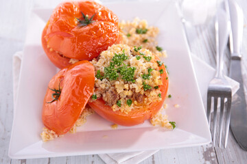 Wall Mural - baked tomato filling with bulgur and parsley- vegetarian dish